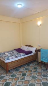 Postel nebo postele na pokoji v ubytování Banabas Homestay