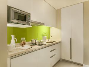 Köök või kööginurk majutusasutuses Citadines Salcedo Makati