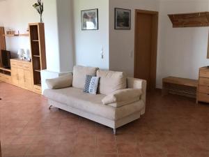 Posezení v ubytování Ferienwohnung Dreimaster W2