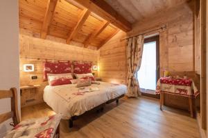 Ένα ή περισσότερα κρεβάτια σε δωμάτιο στο Chalet La Garde
