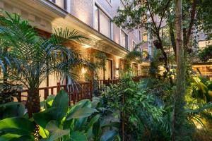 Giardino di Hotel Thrive, A Tropical Courtyard