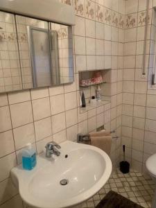 Ένα μπάνιο στο Ferienwohnung Saarpromenade