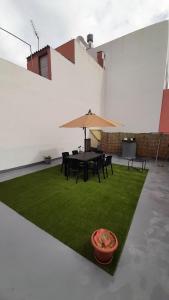 En terrasse eller udendørsområde på AbumaHouse + 16 billeder