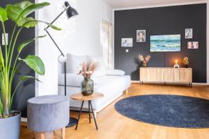 Postel nebo postele na pokoji v ubytování stycoz - Modernes Loft - 80 m2 - Küche - Parken
