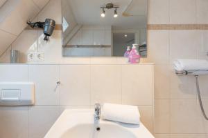 Koupelna v ubytování Roemser Stuebchen + 5 fotografií