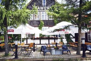 Reštaurácia alebo iné gastronomické zariadenie v ubytovaní Siwa Czapla