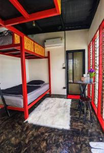 Ένα ή περισσότερα κρεβάτια σε δωμάτιο στο KANNA Hostel