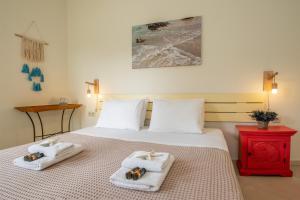 A bed or beds in a room at Chryssi myHome