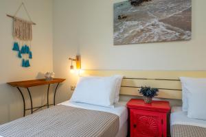 A bed or beds in a room at Chryssi myHome