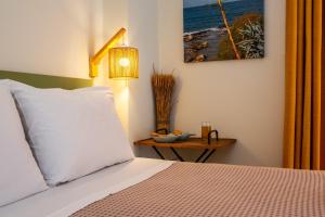 A bed or beds in a room at Chryssi myHome
