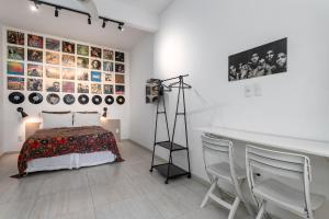 Кровать или кровати в номере STUDIOS URCA na rua da mureta da Urca