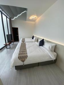 Letto o letti in una camera di Mou Xia Villa