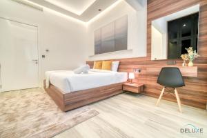 Postel nebo postele na pokoji v ubytování Modern 1BR at Marina Park Dubai Marina by Deluxe Holiday Homes
