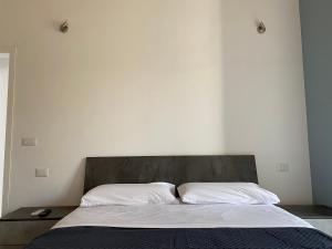 Кровать или кровати в номере Casa Monsù