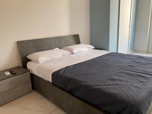 Кровать или кровати в номере Casa Monsù