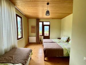 Letto o letti in una camera di Hotel Lamala