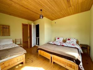 Letto o letti in una camera di Hotel Lamala