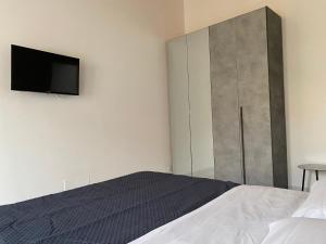 Кровать или кровати в номере Casa Monsù