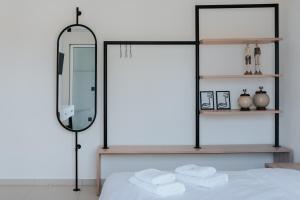Voodi või voodid majutusasutuse Ponte Suites toas