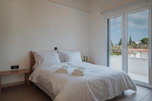 Postel nebo postele na pokoji v ubytování Ponte Suites + 37 fotografií