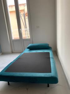 Кровать или кровати в номере Casa Monsù