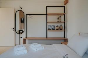 Voodi või voodid majutusasutuse Ponte Suites toas