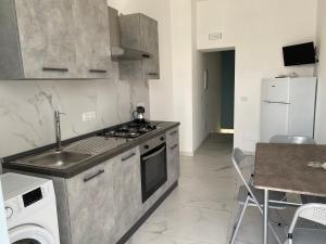 Кухня или мини-кухня в Casa Monsù
