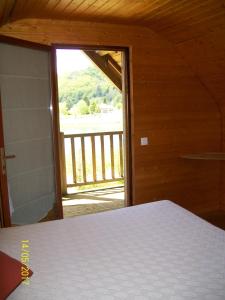 Postel nebo postele na pokoji v ubytování Lac des Graves