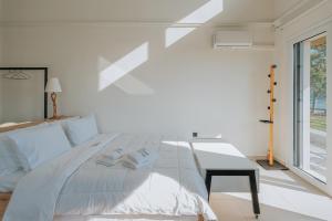 Voodi või voodid majutusasutuse Ponte Suites toas