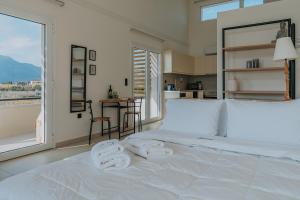 Voodi või voodid majutusasutuse Ponte Suites toas