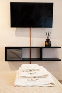 TV a/nebo společenská místnost v ubytování Bed and Breakfast Le Foglie