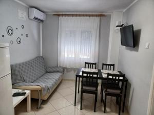 Posedenie v ubytovaní Apartmani Sidro