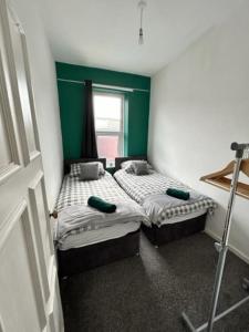Een bed of bedden in een kamer bij Quayside East 2 Bed