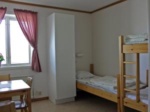 Postel nebo postele na pokoji v ubytování Öje Vandrarhem & Turistgård + 16 fotografií