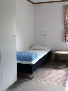 Postel nebo postele na pokoji v ubytování Öje Vandrarhem & Turistgård