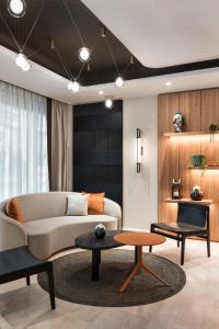 Area soggiorno di Tapestry by Hilton Ambasciatori Hotel