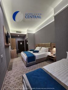 a hotel terminal with two beds in a room at Central Hotel Sofia in Sofia