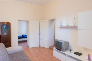 TV a/nebo společenská místnost v ubytování Villa Isidoro