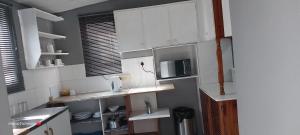 Kuchyň nebo kuchyňský kout v ubytování Rato Thato Guest House + 7 fotografií