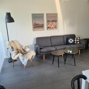 Coin salon dans l'établissement Slettestrandvej Apartment - Slettestrandvej 130 nr. 7 - ID 627