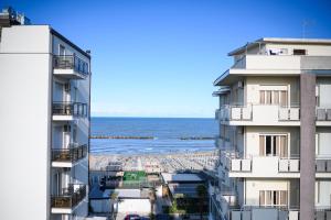 a view of the ocean from a building at Hotel de Paris in Lido di Savio