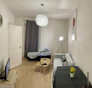 En eller flere senge i et værelse på Apartment T2 Le Mans TGV Station