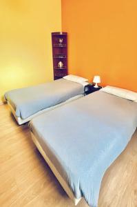 Postel nebo postele na pokoji v ubytování Casa Silva Pinhal Novo