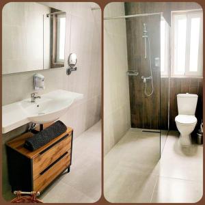 a bathroom with a sink and a shower and a toilet at BRAND NEW holiday accommodation in Xewkija