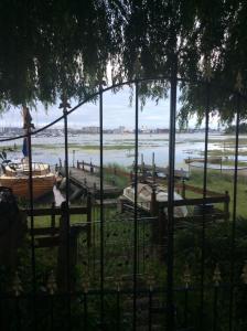 a view of a river with boats in the water at HarbourSide Studio apartment Poole Hamworthy Bh15 in Hamworthy