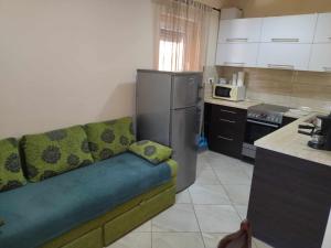 Kuchyňa alebo kuchynka v ubytovaní Csaba apartman