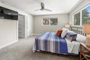 a bedroom with a bed and a ceiling fan at Pimlico Pastures in Eagle