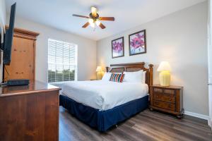 Ένα ή περισσότερα κρεβάτια σε δωμάτιο στο Location Location Orlando Resort Near All Parks! Int'l Dr +26 φωτογραφίες