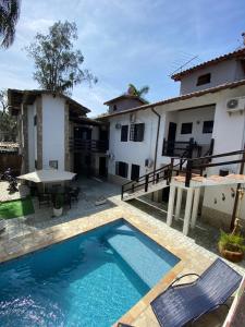 Bazén v ubytování Pousada Villa Real Paraty - Localização e café da manhã EXCELENTES" nebo v jeho okolí