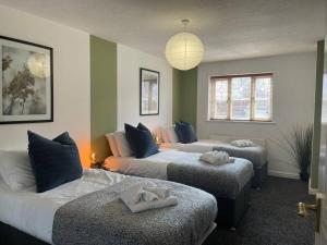 Кровать или кровати в номере Ramson's Homestead by M-GroupSA